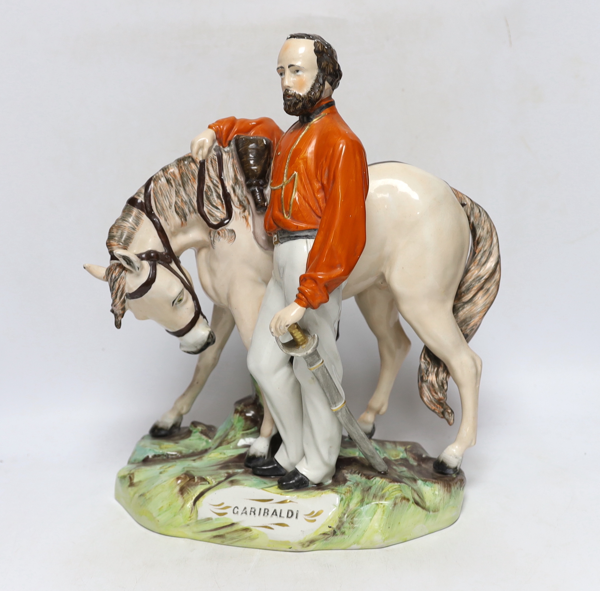 A mid 19th century Staffordshire group of Garibaldi by Thomas Parr, 37cm high